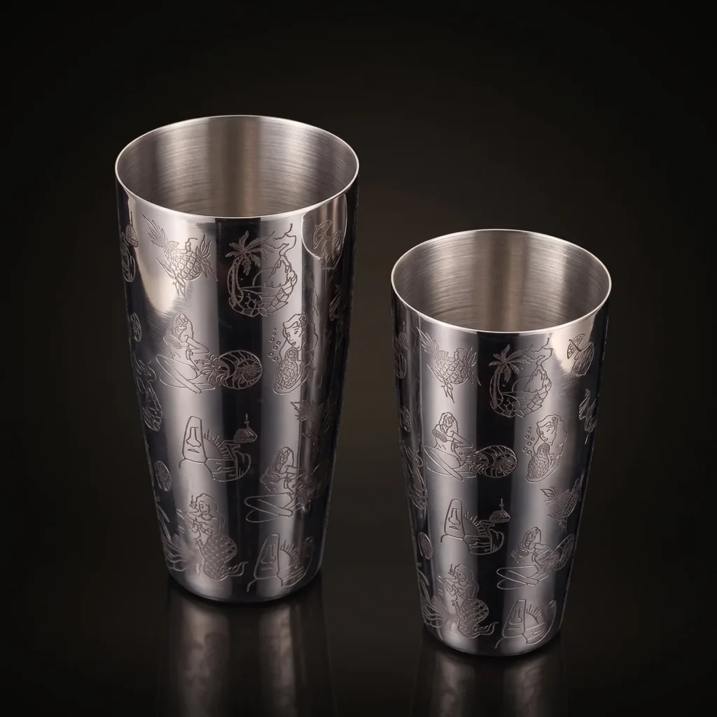 Silver engraved Boston shaker, Hula pattern, three-quarter view