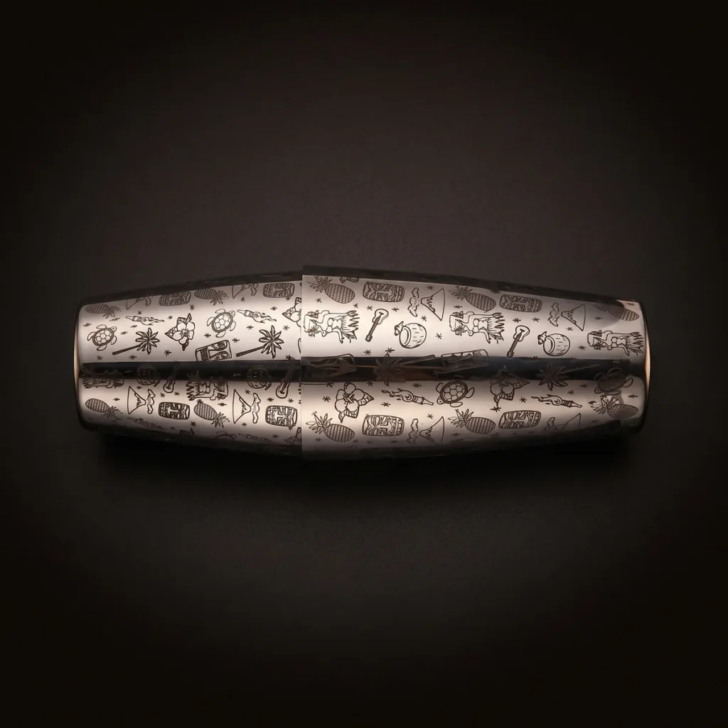Silver engraved Boston shaker, Tiki pattern, top view