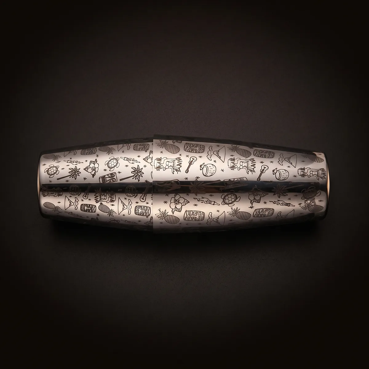 Silver engraved Boston shaker, Tiki pattern, top view