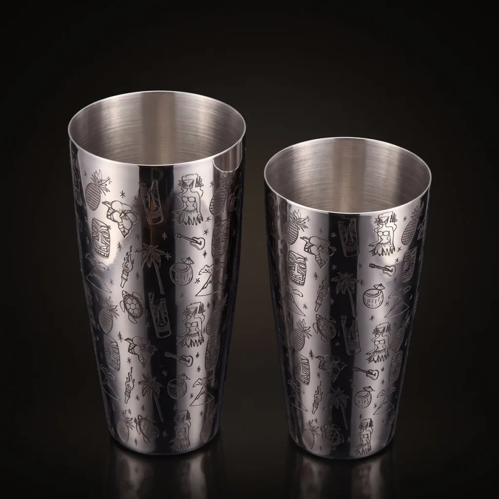 Silver engraved Boston shaker, Tiki pattern, three-quarter view