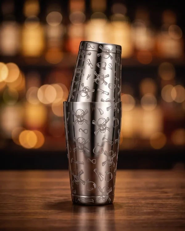 Engraved Boston shaker, mirror-finish skull, on a bar counter