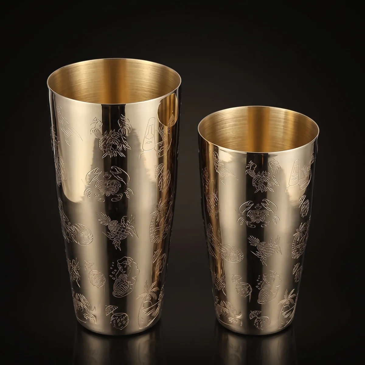 Gold engraved Boston shaker, Hula pattern, three-quarter view