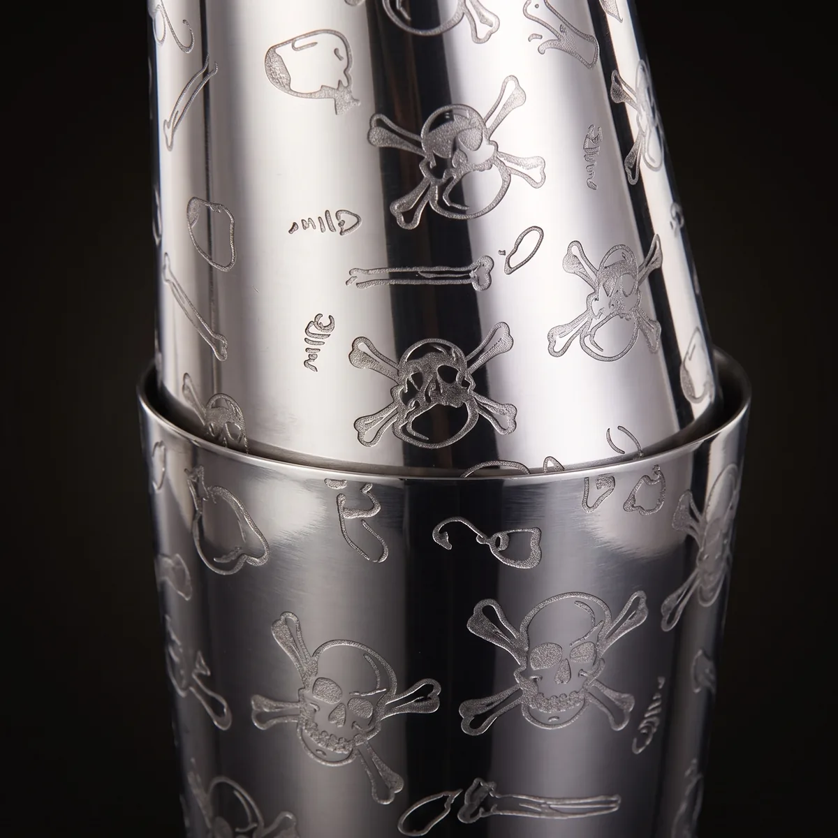 Engraved Boston shaker, skull pattern, three-quarter view