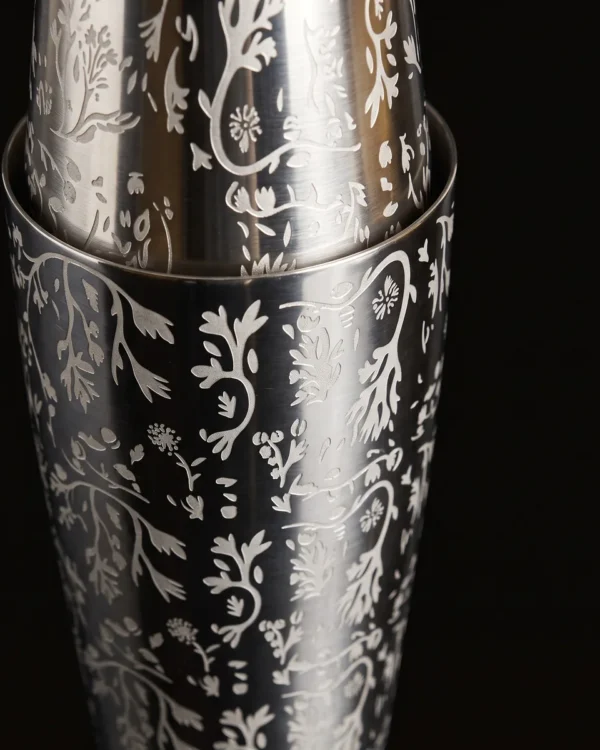 Engraved Boston shaker, foliage pattern, three-quarter view