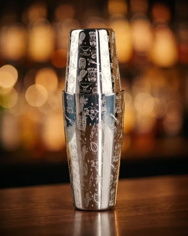 Engraved Boston shaker, Hawaiian pattern, on a bar counter