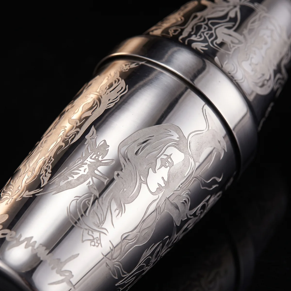 Engraved Boston shaker, Viking queen pattern, three-quarter view