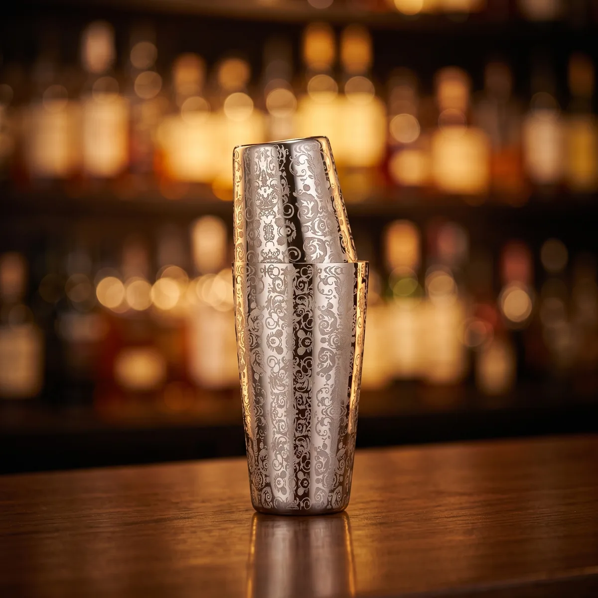 Engraved Boston shaker, Royalty pattern, on a bar counter