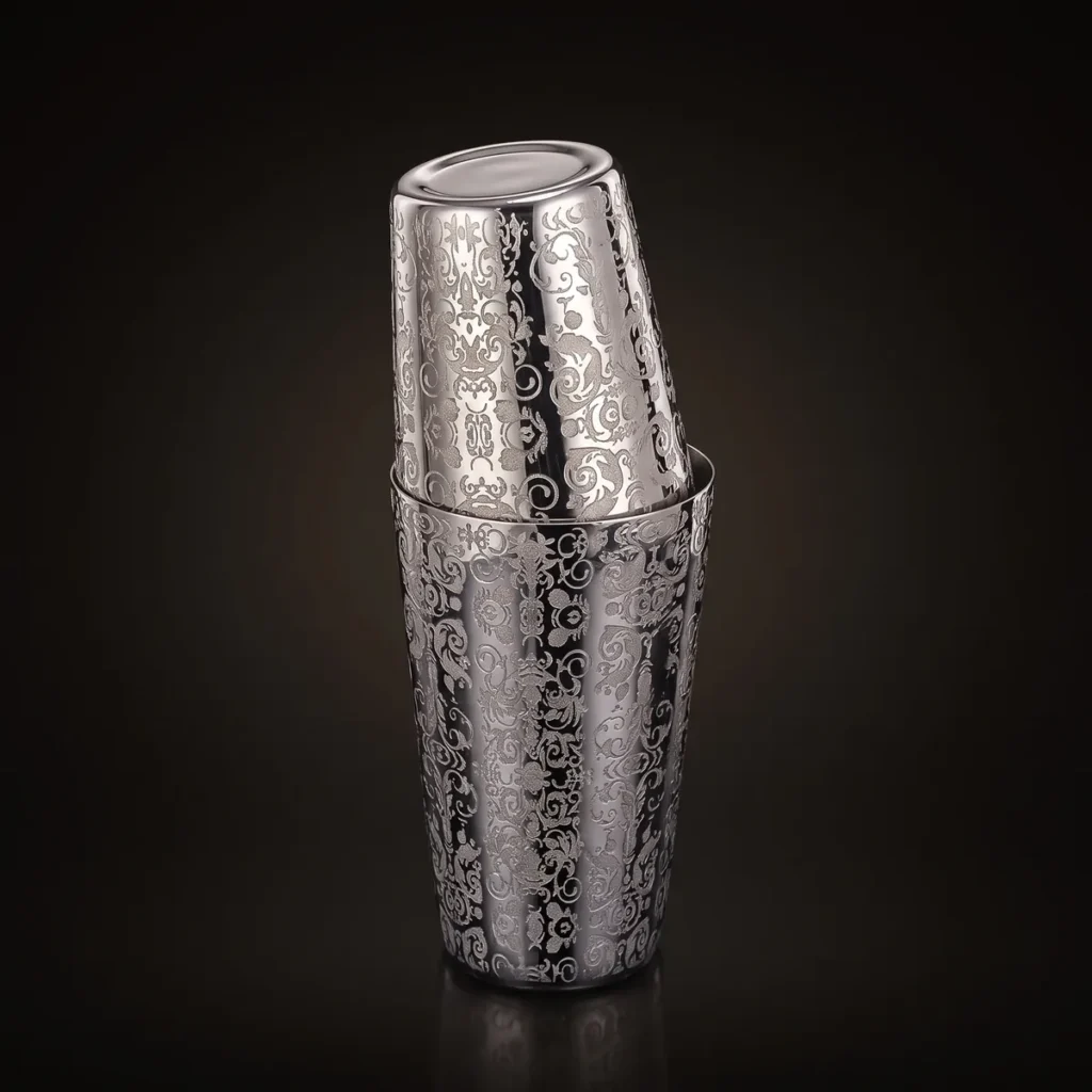 Engraved Boston shaker, Royalty pattern, three-quarter view