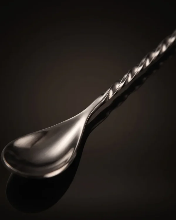 Twisted bar spoon 30 cm, black, three-quarter view