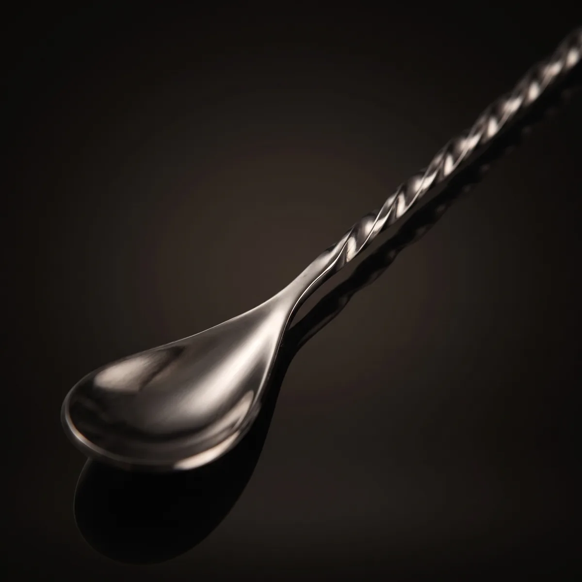 Twisted bar spoon 30 cm, black, three-quarter view