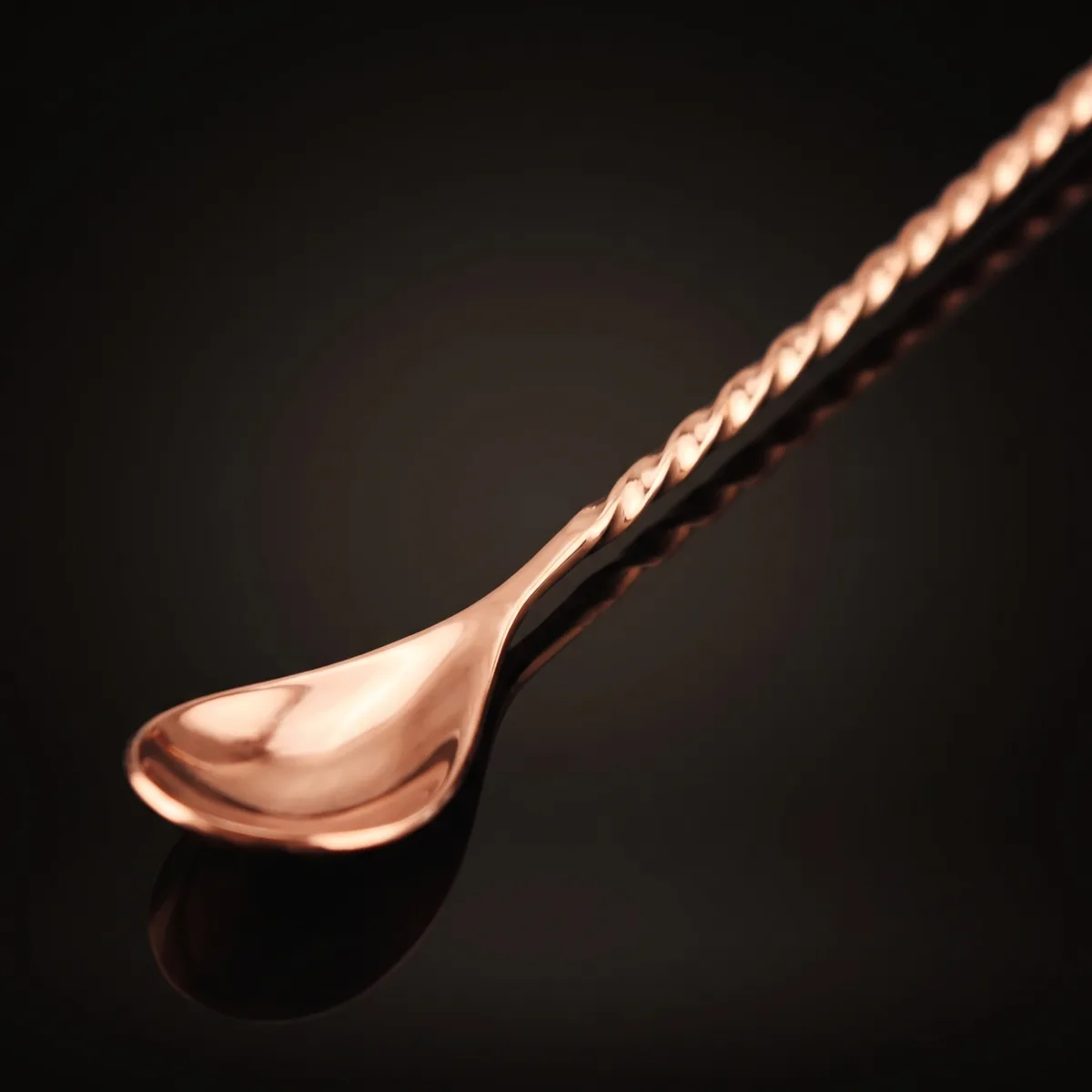 Twisted bar spoon 30 cm, rose gold, three-quarter view
