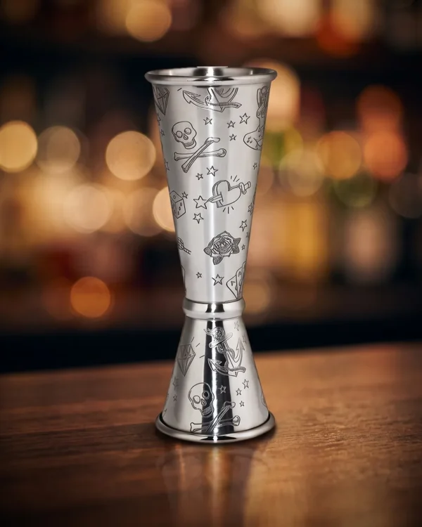 Engraved double jigger 30/60 ml, on a bar counter