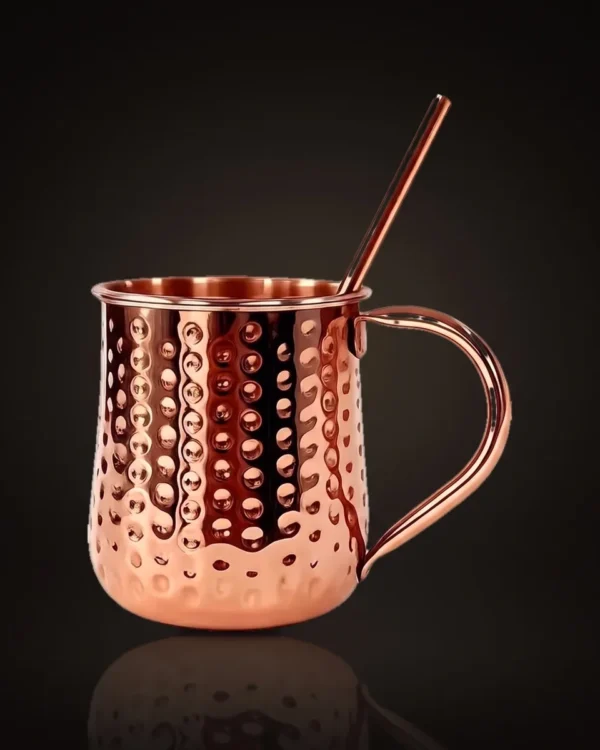 Hammered copper Moscow Mule mug with straw, front view