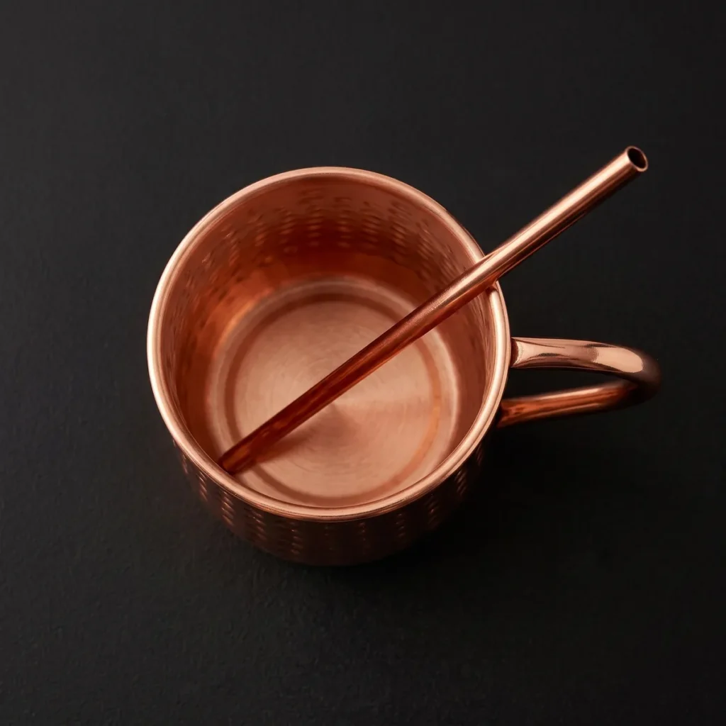 Hammered copper Moscow Mule mug with straw, top view