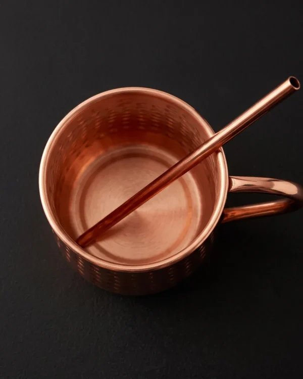 Hammered copper Moscow Mule mug with straw, top view