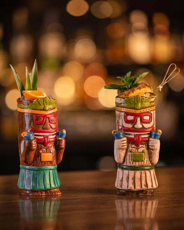 Tiki mugs with glasses 500 ml, set of 2, on a bar counter