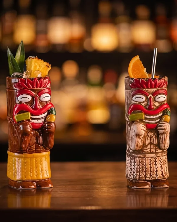Red-headdress chief tiki mugs 450 ml, set of 2, on a bar counter