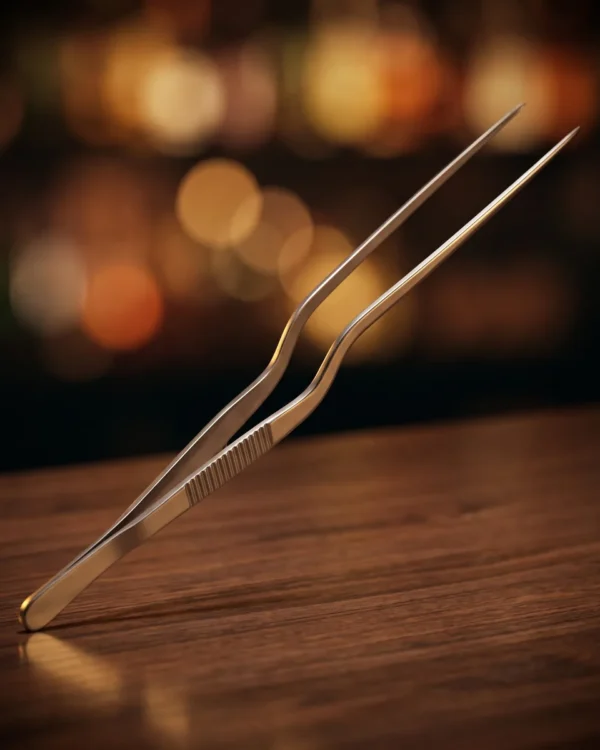 Stainless steel garnish tongs 30 cm, on a bar counter