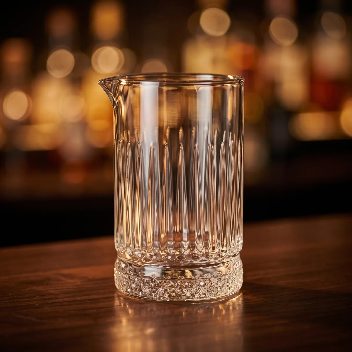Mixing glass 700 ml, vertical ribs, on a bar counter
